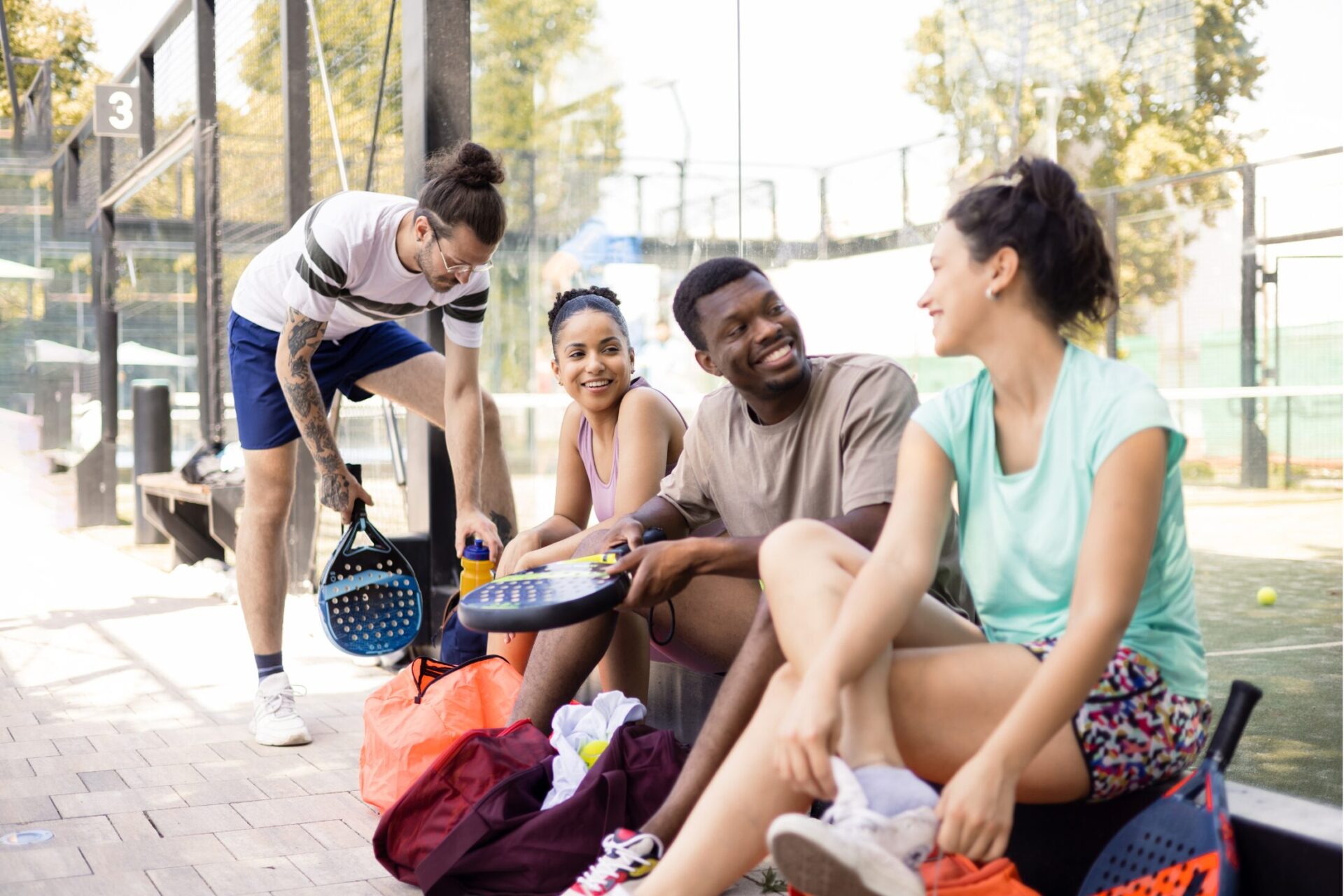 padel players outside a padel court